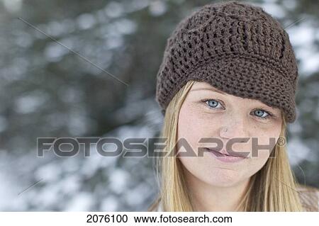 Portrait Of A Woman Wearing A Winter Hat View Large Photo Image Stock Image - Portrait Of A Woman Wearing A Winter Hat. Fotosearch