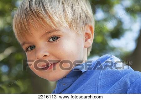 Portrait Of A Young Blonde Boy; Ontario Canada View Large Photo Image Stock Image - Portrait Of A Young Blonde Boy; Ontario Canada. Fotosearch