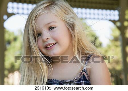 Stock Photography - Portrait Of A Young Blonde Girl; Ontario Canada. Fotosearch