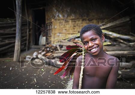 Portrait of a young boy; Pentecost Island, Vanuatu View Large Photo Image Stock Photo - Portrait of a young boy; Pentecost Island, Vanuatu. Fotosearch