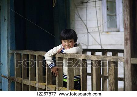 Portrait of a young girl; Gangtok, Sikkim, India View Large Photo Image Stock Photo - Portrait of a young girl; Gangtok, Sikkim, India. Fotosearch