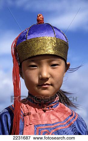 Stock Photo - Portrait Of A Young Girl In Traditional Dress, Naadam Festival, Ulan Batar, Mongolia. Fotosearch
