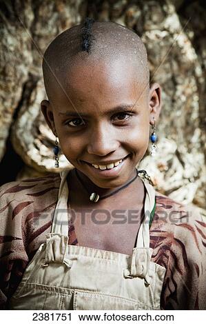 Stock Image - Portrait of a young goat herder girl; Tigray region, Ethiopia. Fotosearch