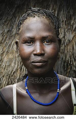 Picture - Portrait of a young Nuer woman, Western Ethiopia; Ethiopia. Fotosearch