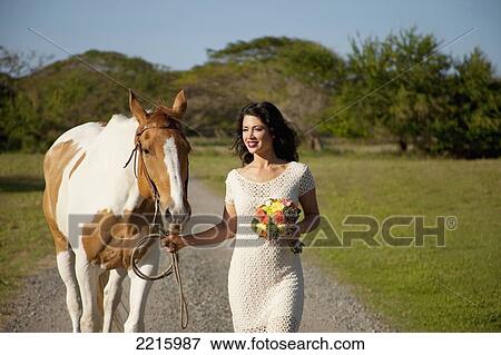 Portrait of a young woman an her horse. View Large Photo Image Stock Photo - Portrait of a young woman an her horse.. Fotosearch