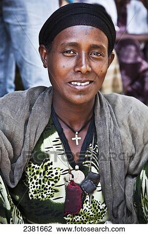 Stock Image - Portrait of a young woman in a headscarf; Ethiopia. Fotosearch