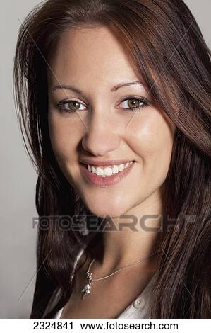 Portrait Of A Young Woman View Large Photo Image Stock Image - Portrait Of A Young Woman. Fotosearch