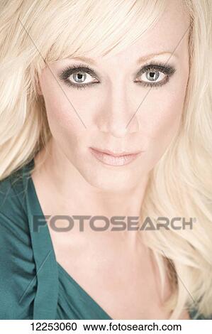 Portrait of a young woman with long blond hair; Edmonton, Alberta, Canada View Large Photo Image Stock Image - Portrait of a young woman with long blond hair; Edmonton, Alberta, Canada. Fotosearch