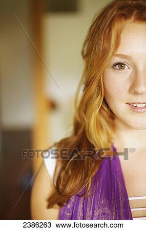 Portrait of a young woman with red hair; Hawaii, United States of America View Large Photo Image Stock Image - Portrait of a young woman with red hair; Hawaii, United States of America. Fotosearch