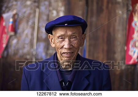 Stock Image - Portrait of an elderly man; Yunnan, China. Fotosearch