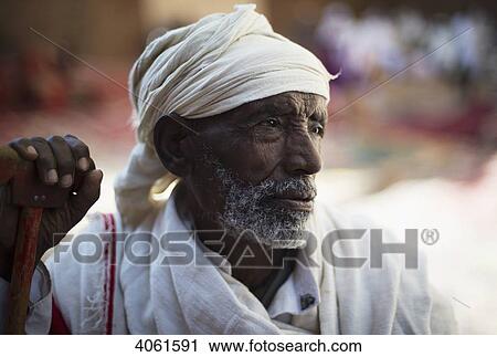 Stock Image - Portrait of an Ethiopian pilgrim; Lalibela, Ethiopia. Fotosearch