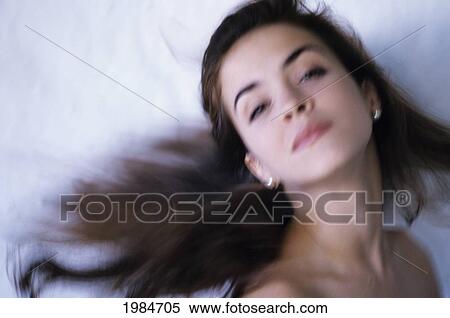 Portrait Of Beautiful Hispanic Woman Shaking Hair, Blurred Motion. View Large Photo Image Stock Photography - Portrait Of Beautiful Hispanic Woman Shaking Hair, Blurred Motion.. Fotosearch