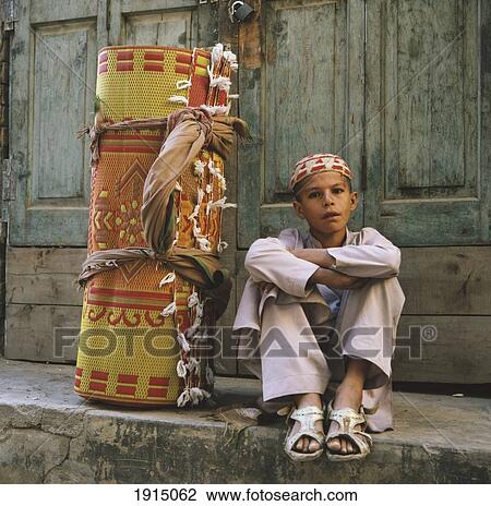 Portrait Of Boy In Street With Rug View Large Photo Image Stock Image - Portrait Of Boy In Street With Rug. Fotosearch