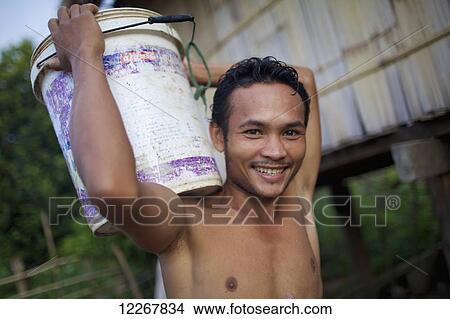 Portrait of Bunong man; Mondulkiri, Cambodia View Large Photo Image Picture - Portrait of Bunong man; Mondulkiri, Cambodia. Fotosearch
