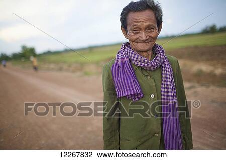 Stock Image - Portrait of Bunong man; Mondulkiri, Cambodia. Fotosearch