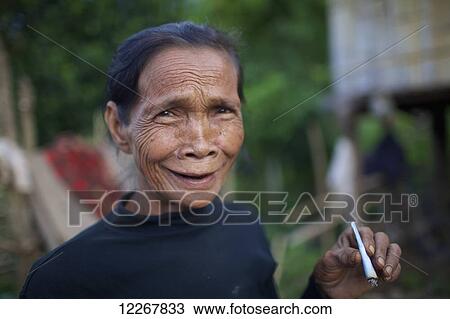 Stock Image - Portrait of Bunong woman; Mondulkiri, Cambodia. Fotosearch