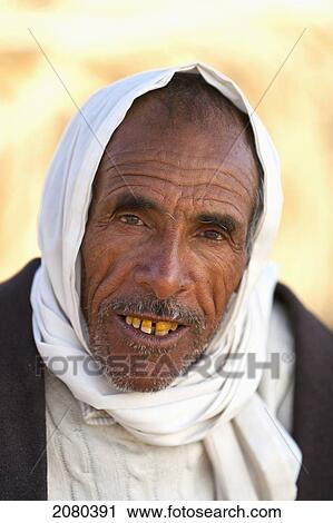 Portrait Of Camel Driver; Zaafrane, Tunisia, North Africa View Large Photo Image Stock Image - Portrait Of Camel Driver; Zaafrane, Tunisia, North Africa. Fotosearch