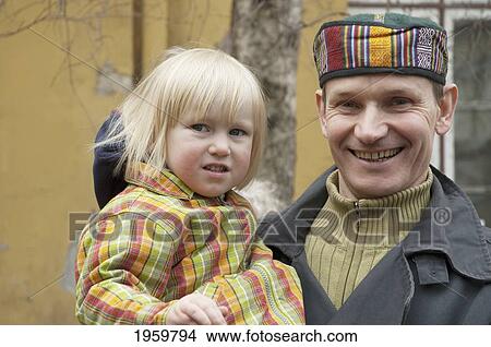 Picture - Portrait Of Happy Father With Daughter, Tallinn, Estonia. Fotosearch