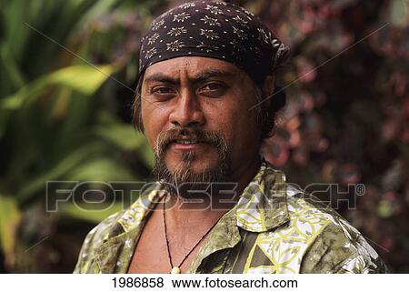Stock Photo - Portrait of local woman outdoors; Easter Island. Fotosearch