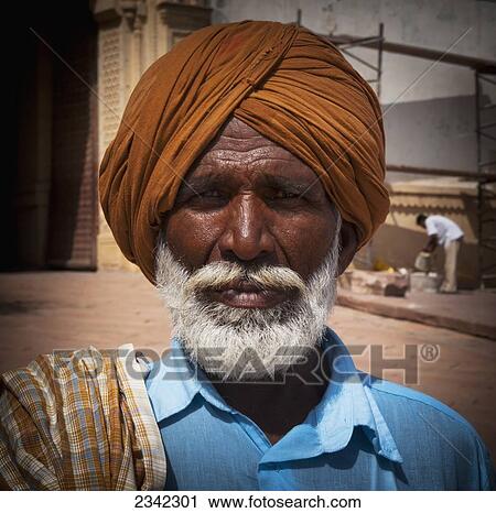Stock Image - Portrait Of Man In Traditional Headwear; India. Fotosearch