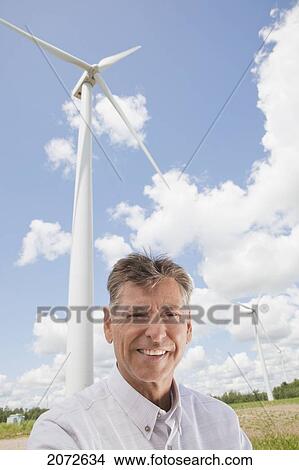 Portrait Of Man On Wind Farm, Near Shelburne, Ontario View Large Photo Image Picture - Portrait Of Man On Wind Farm, Near Shelburne, Ontario. Fotosearch