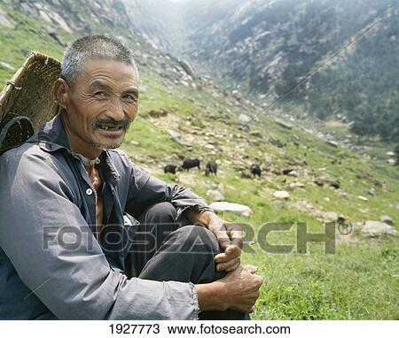 Stock Image - Portrait Of Mountain Goat Herder. Fotosearch