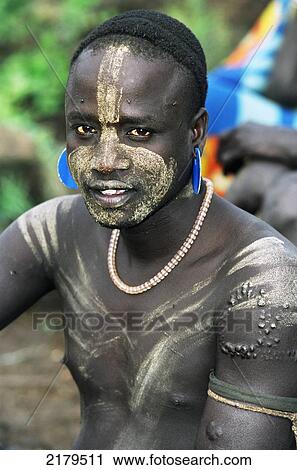 Stock Image - Portrait of Mursi tribal man. Makki / South Omo / Southern Nations, Nationalities & People's Region (Ethiopia).. Fotosearch