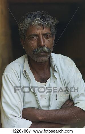 Portrait of Rajasthani man; Jodhpur, Rajasthan, India View Large Photo Image Stock Photo - Portrait of Rajasthani man; Jodhpur, Rajasthan, India. Fotosearch
