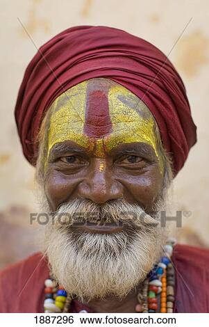 Stock Photograph - Portrait Of Sadhu In Red Turban And Beard. Fotosearch