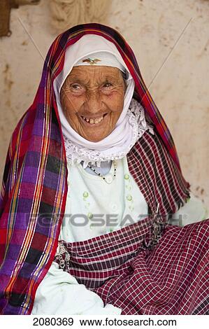 Portrait Of Senior Woman In Tataouine Province; Matmata, Tunisia, North Africa View Large Photo Image Stock Photo - Portrait Of Senior Woman In Tataouine Province; Matmata, Tunisia, North Africa. Fotosearch