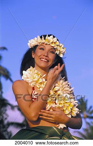 Portrait Of Smiling Woman Wearing Plumeria Haku And Leis, Golden Light View Large Photo Image Stock Image - Portrait Of Smiling Woman Wearing Plumeria Haku And Leis, Golden Light. Fotosearch