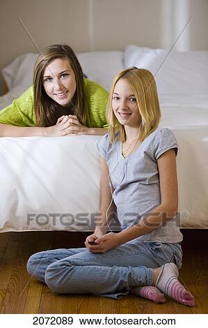 Portrait Of Teenage Girls In A Bedroom, Bradford, Ontario View Large Photo Image Stock Photo - Portrait Of Teenage Girls In A Bedroom, Bradford, Ontario. Fotosearch