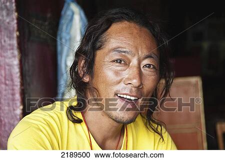 Stock Image - Portrait Of Tibetan Man In Tibetan Refugee Colony In Leh, Ladhak, India. Fotosearch