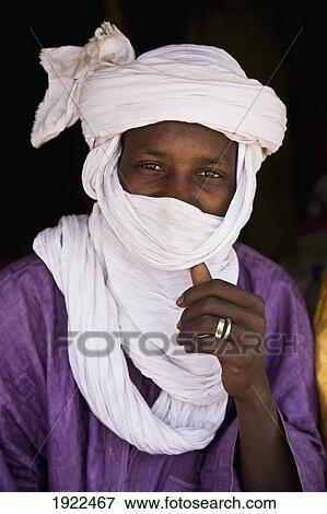 Stock Photo - Portrait Of Tuareg Man In White Headdress. Fotosearch