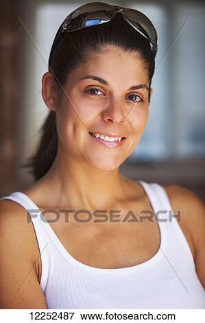 Portrait of woman in her 30s with sunglasses on her head; Bradford, Ontario, Canada View Large Photo Image Stock Photo - Portrait of woman in her 30s with sunglasses on her head; Bradford, Ontario, Canada. Fotosearch