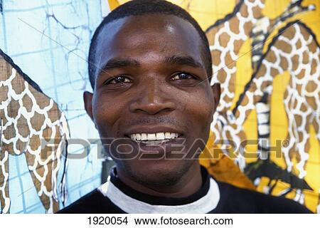 Portrait Of Young Man Smiling; Johannesburg, South Africa View Large Photo Image Picture - Portrait Of Young Man Smiling; Johannesburg, South Africa. Fotosearch