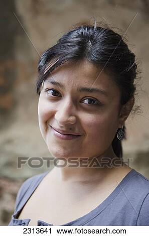 Stock Image - Portrait of young woman; Guanajuato, Guanajuato State, Mexico. Fotosearch