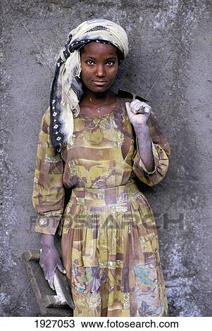 Stock Image - Portrait Of Young Working Girl With Dirty Hands. Fotosearch