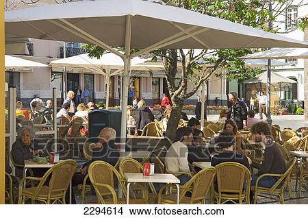 Portugal, Azores, Sao Miguel Island, Outdoor cafe; Ponta Delgada View Large Photo Image Picture - Portugal, Azores, Sao Miguel Island, Outdoor cafe; Ponta Delgada. Fotosearch