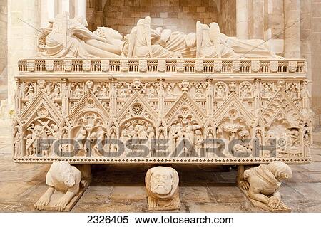 Stock Photography - Portugal, Estremadura and Ribatejo, 12th century Cistercian Monastery of Santa Maria; Alcobaca, Tomb of Dona Ines de Castro resting on grotesque figures of her murderers. Fotosearch