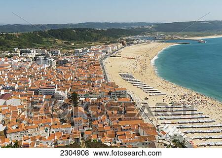 Portugal, Estremadura Province, Nazare Beach seen from the old village of Sitio on top of the cliff; Nazare View Large Photo Image Stock Photo - Portugal, Estremadura Province, Nazare Beach seen from the old village of Sitio on top of the cliff; Nazare. Fotosearch