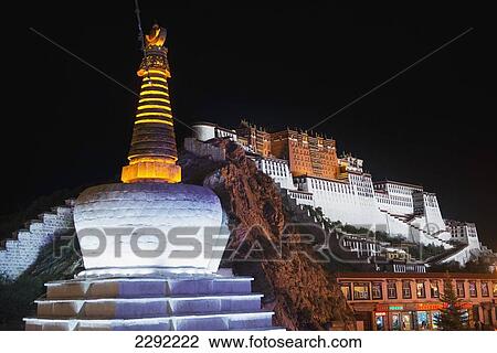 Stock Image - Potala Palace at night; Lhasa, Xizang, China. Fotosearch