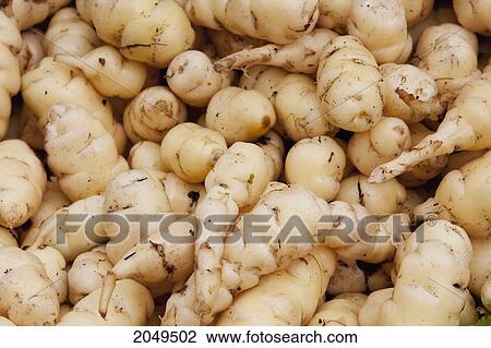 Stock Image - Potatoes For Sale At The Saturday Market, Otavalo, Imbabura, Ecuador. Fotosearch