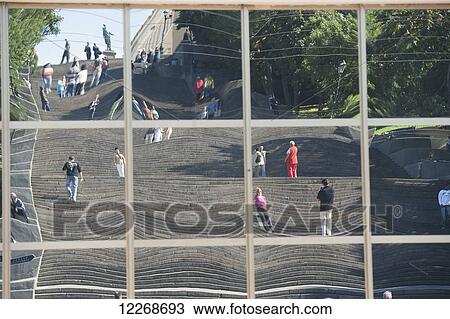 Stock Image - Potemkin Steps (or Primorsky Stairs) reflected in the modern building opposite; Odessa, Ukraine. Fotosearch