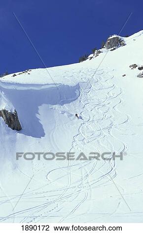 Stock Image - Power Skiing On Grand Targhee. Fotosearch