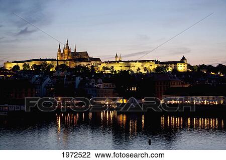 Stock Image - Prague Castle Reflected In The Vltava River In The Evening, Prague, Czech Republic. Fotosearch