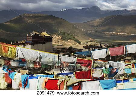 Stock Photo - Prayer Flags And Monastery, Yunnan Province, China.. Fotosearch