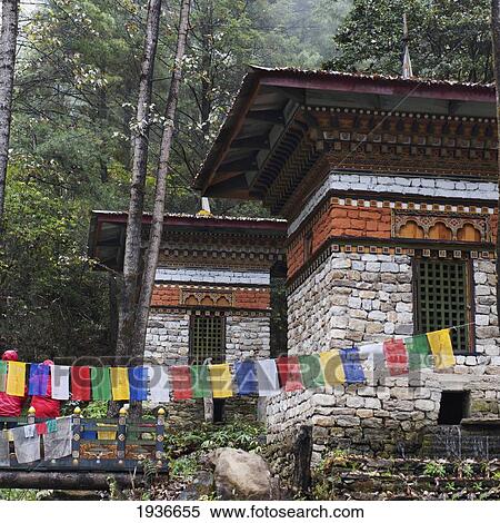 Prayer Flags Hanging In Front Of Tiger's Nest Monastery; Paro District Bhutan View Large Photo Image Stock Photography - Prayer Flags Hanging In Front Of Tiger's Nest Monastery; Paro District Bhutan. Fotosearch