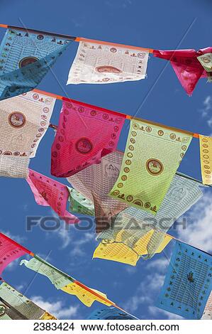 Picture - Prayer flags in the breeze; Zhongdian, Yunnan, China. Fotosearch