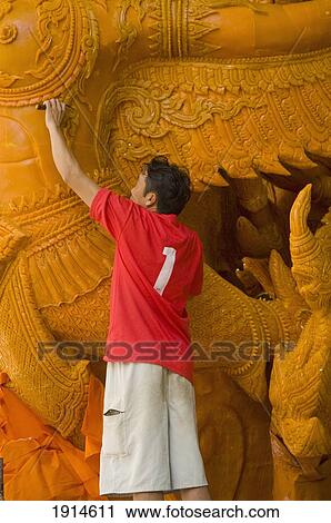 Stock Image - Preparing Float For Candle Wax Festival. Fotosearch